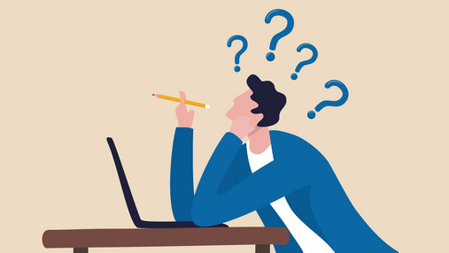 Was ist ein Beamter? - kurz erklärt Foto zum Thema "was ist ein Beamter": Zu sehen eine Grafik einer männlichen Person, die vor einem Laptop am Schreibtisch sitzt und nachdenkt, Über dem Kopf schwirren Fragezeichen.
